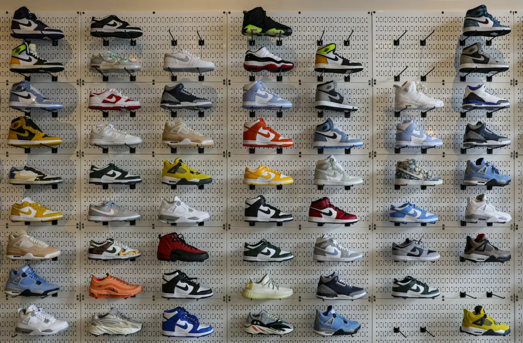 Wall display of original branded sneakers