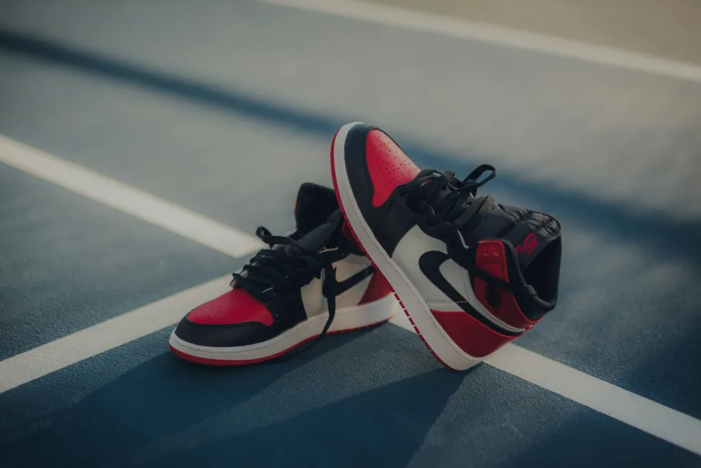 Pair of black, white and red Air Jordan sneakers